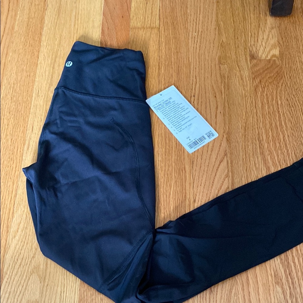 lululemon wunder under HR 25”. Mesh on bottom part of pant